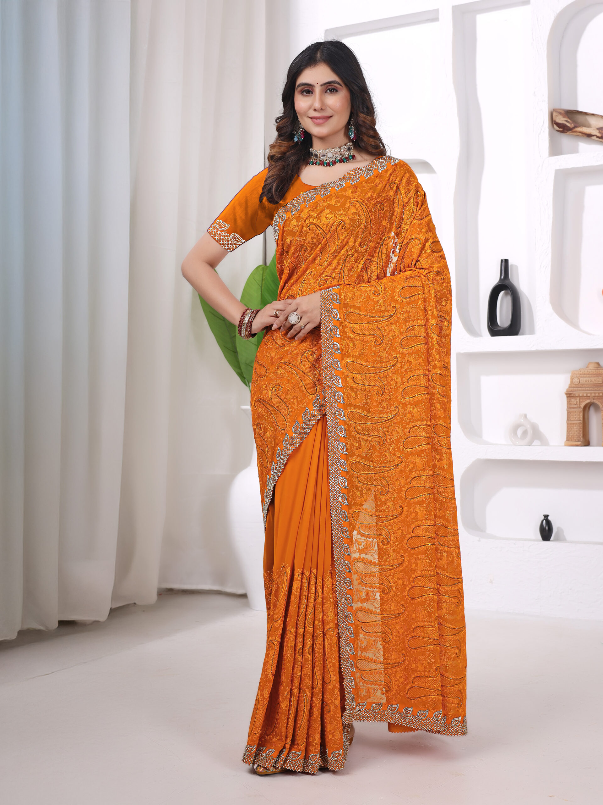 yellow georgette Jurcan work saree with detailed embroidery and a traditional border by Ritual Styles.