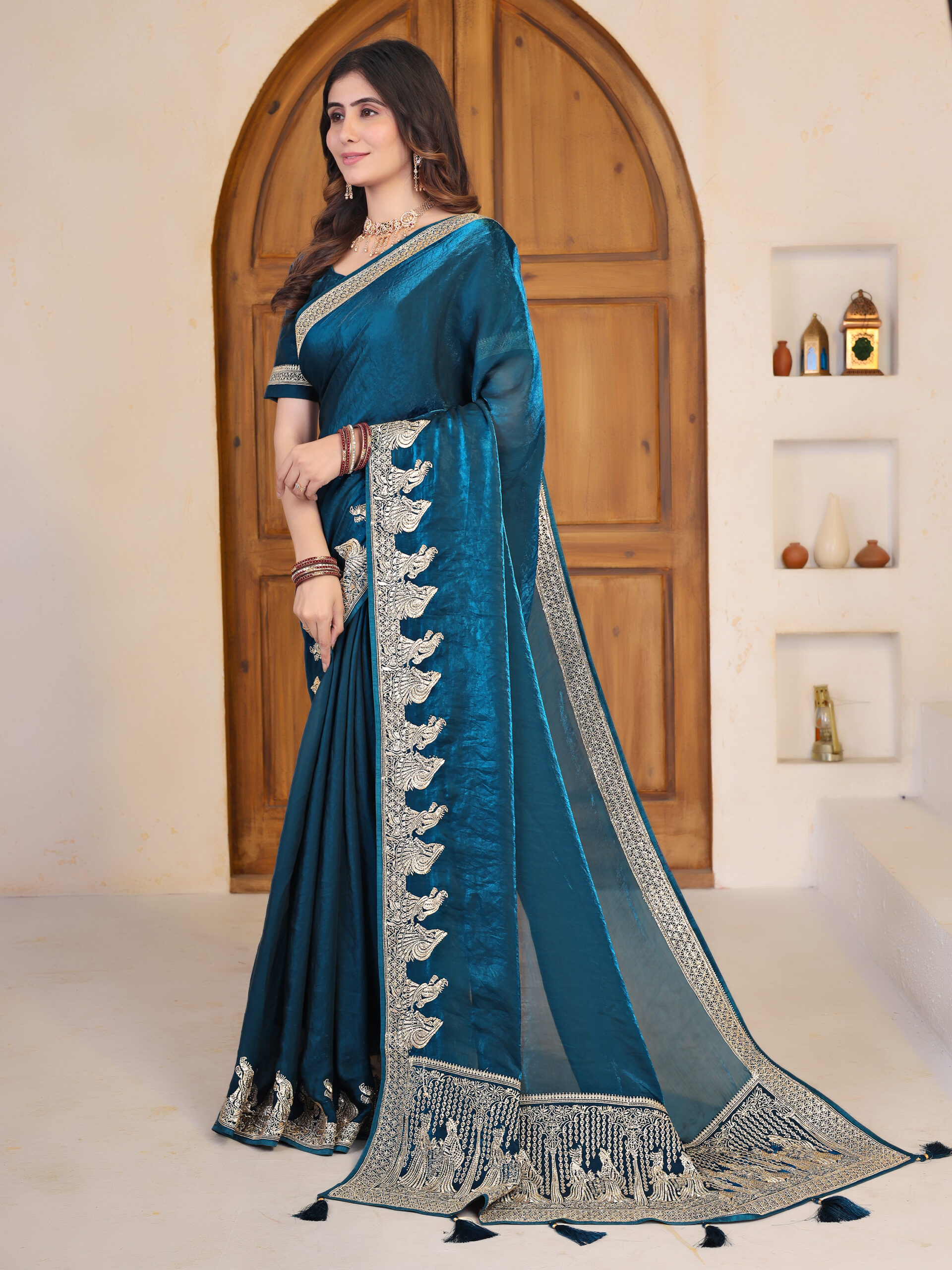 Fendi satin saree with Swarovski work and intricate embroidered border by Ritual Styles