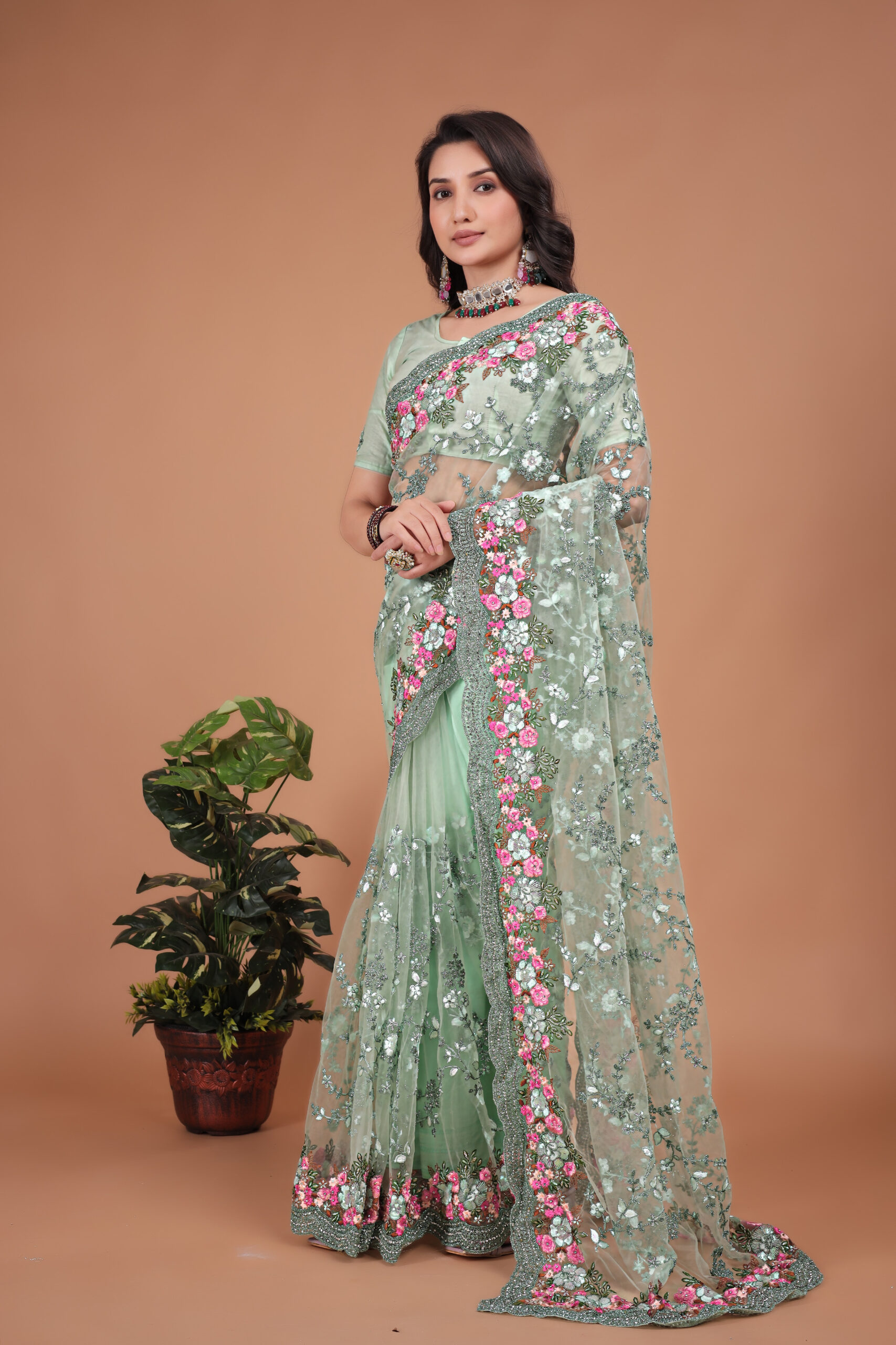 Pista Swarovski Floral Border Net Saree